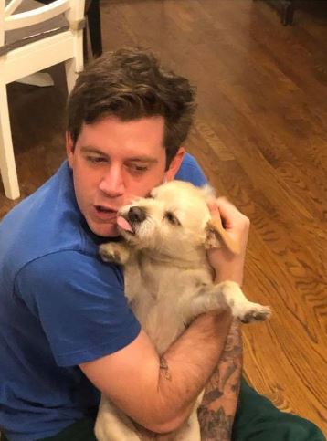 Elden with his pet dog
