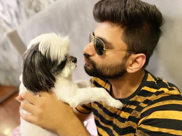 Harsh Gujral with his pet dog Oreo