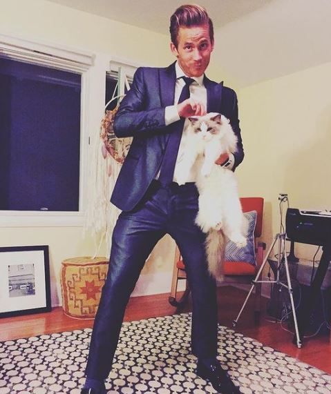 Hughes with his pet cat