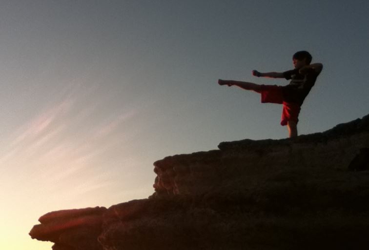 Ian Ousley practicing Taekwondo