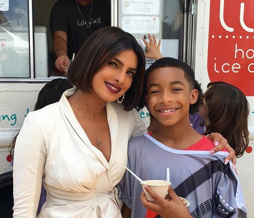 Isaiah Russell-Bailey was photographed with Priyanka Chopra on the sets of We Can Be Heroes