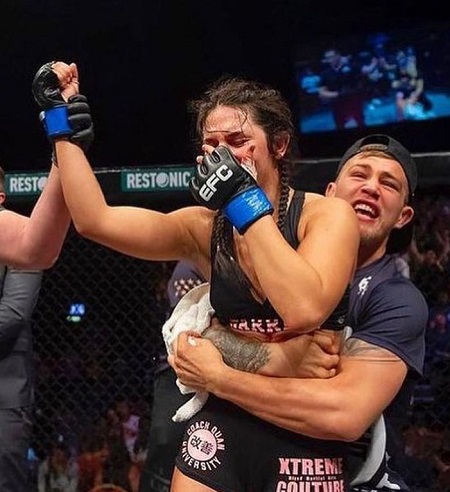 JP Buys was photographed with his wife Cheyanne Buys (fellow MMA Fighter) soon after defeating Gloria de Paula during UFC Fight Night on July 31, 2021
