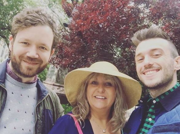 Kyle Griffin with his mother Janice L. Griffin and husband Joel