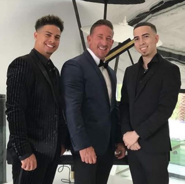 Landon McBroom with his father Michael McBroom and brother Austin McBroom