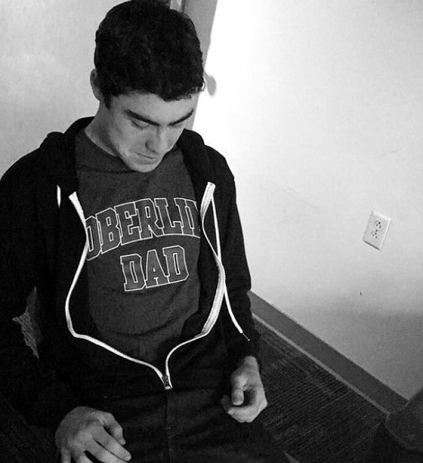 Nate Odenkirk sporting his college's sweatshirt