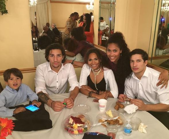 Nico Ali Walsh with his siblings