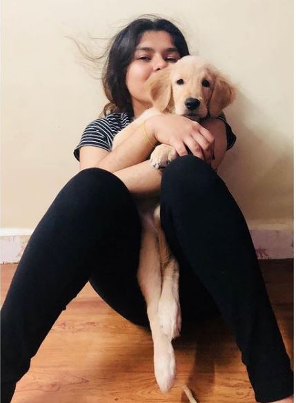 Nidhi Bhanushali with her pet dog