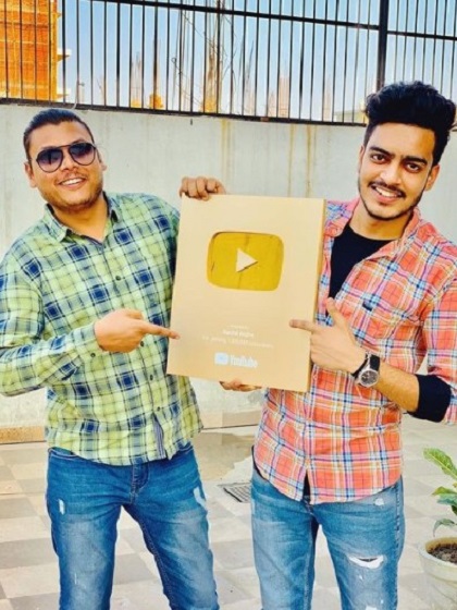 Rachit Rojha with Rahul Kanojia receiving the Golden Play Button