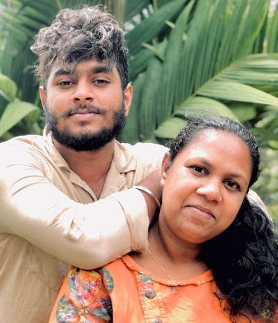 Satheeshan with his mother