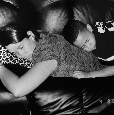 A childhood picture of Devin Booker with his mother