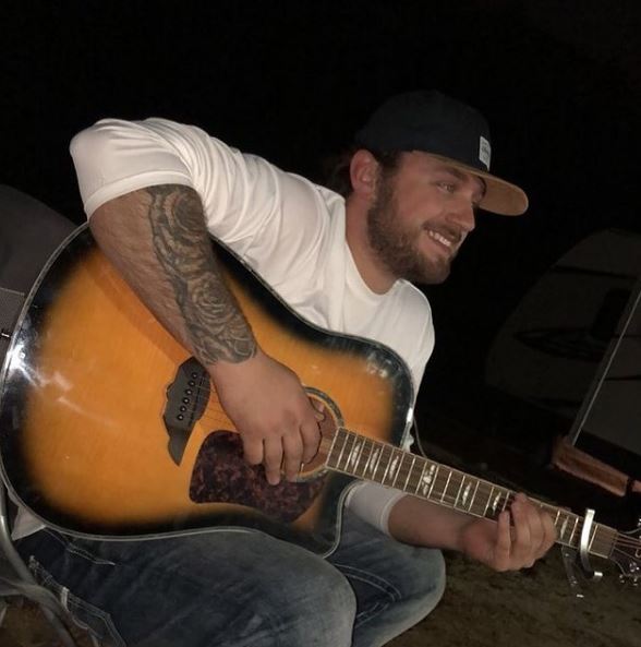 Austin Wallace likes to play guitsr