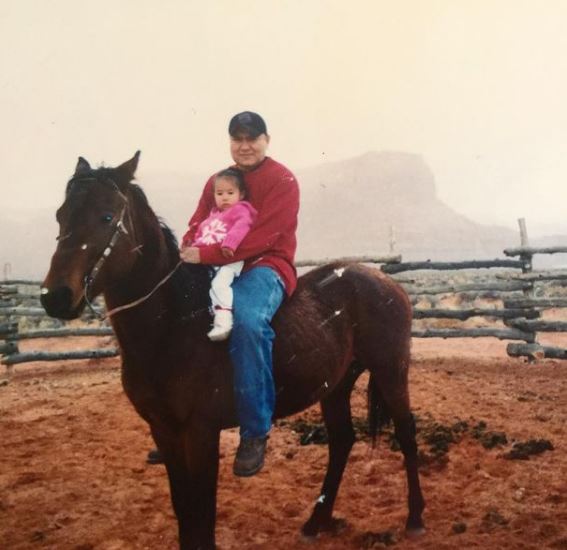 Childhood photo of Quannah Chasinghorse with her dad Eli Black