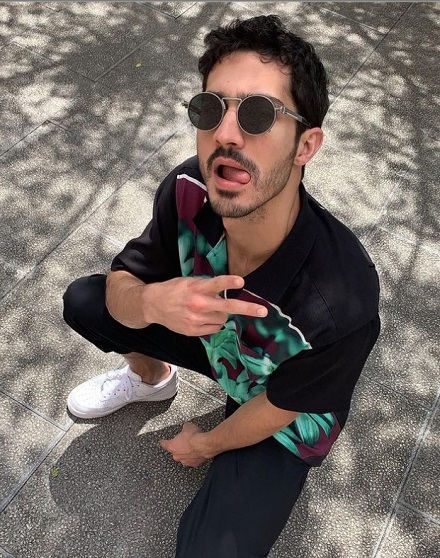 Chino Darin posing for his feed