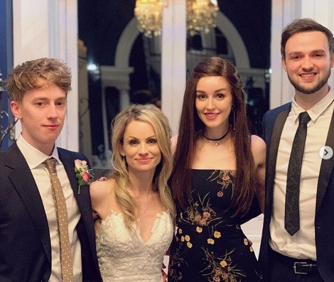 Clare Siobhan with her boyfriend Alia at her close friend Lottie's wedding