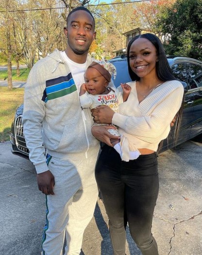 Desi Banks with his fiancé and baby son