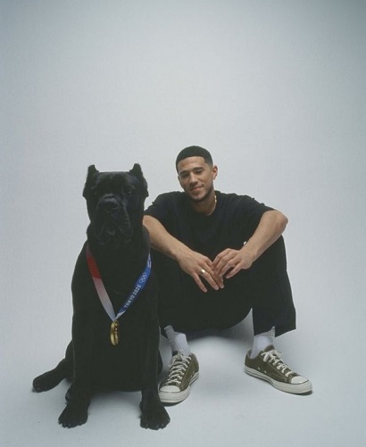 Devin Booker with his best friend, his pet dog