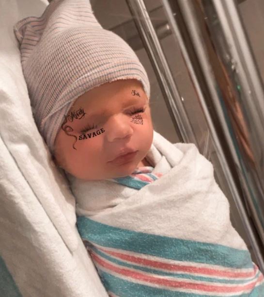 Elon Musk and Grimes's child X Æ A-12