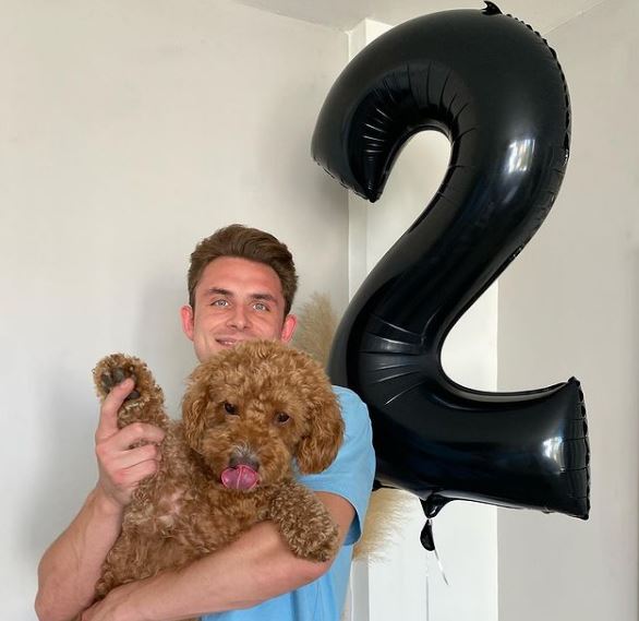 James Kennedy celebrating his dogs's 2nd birthday