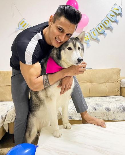 Jay Dudhane with his pet dog