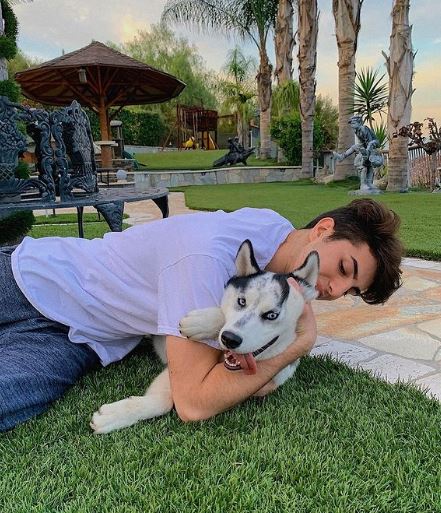 Keemokazi with his pet dog