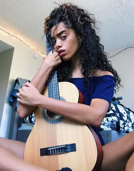 Kiara loves to play guitar