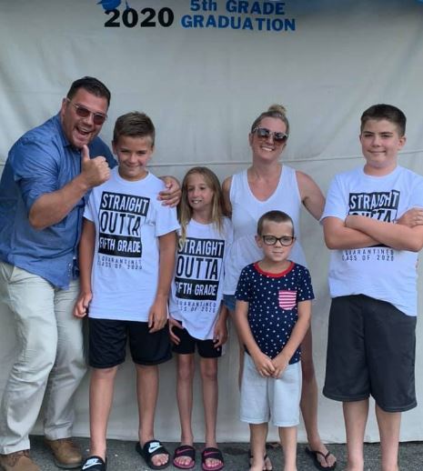 Kyle Van De Water with his family