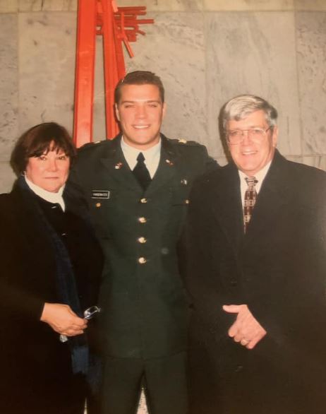 Kyle Van De Water with his parents