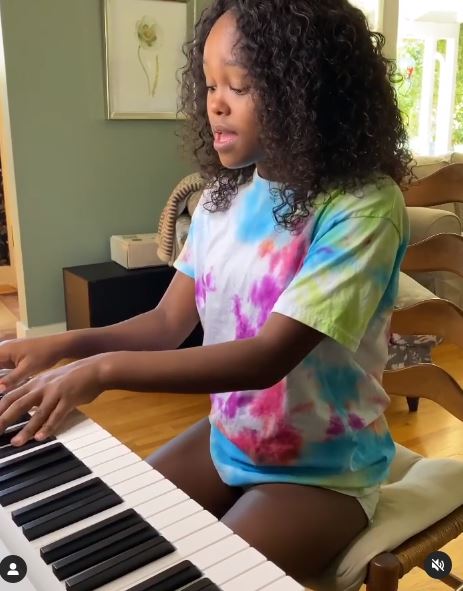 Lidya Jewett learns piano