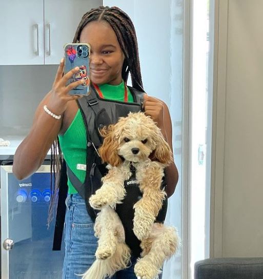 Lidya Jewett with her pet dog