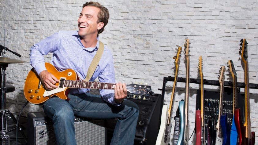 Mason Morfit loves to play guitar