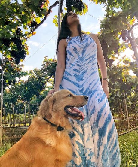 Mira with her pet dog