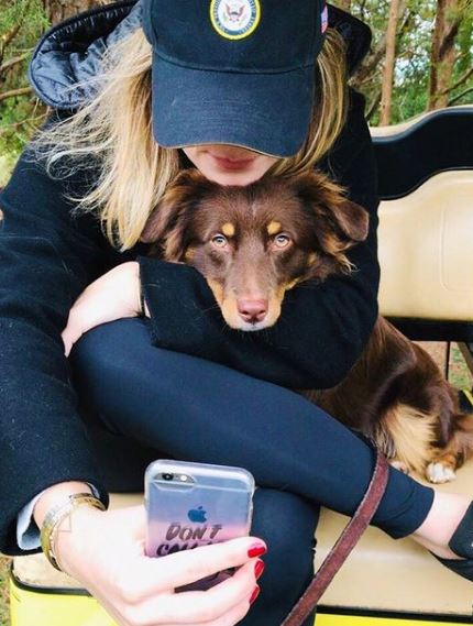 Naomi Biden with her pet dog