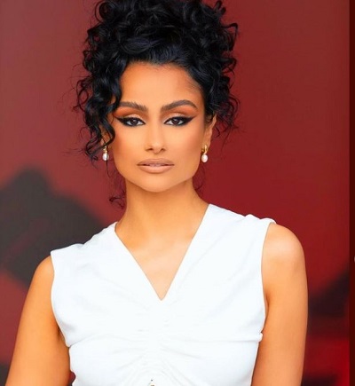 Nazanin Mandi attended Valencia High School