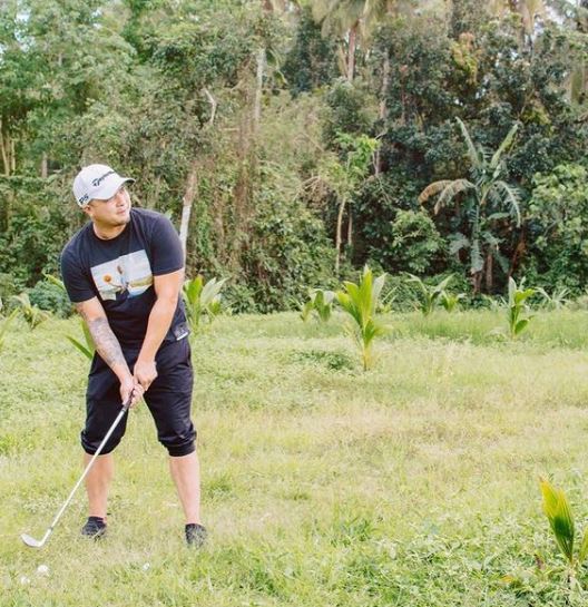Neil Arce often plays golf