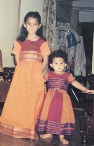 Old image of Ria Dabi with her sister Tina Dabi