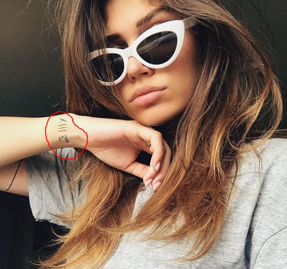 Olga Sharypova tattoo