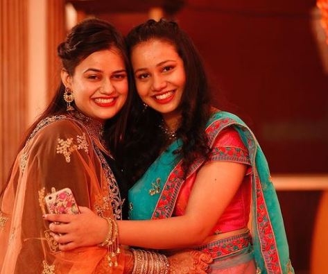 Ria Dabi with her sister