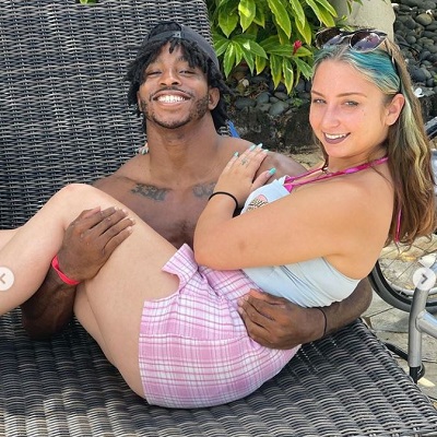 Zion Clark with his girlfriend
