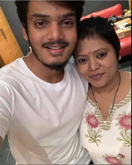 Akash Puri with his mother