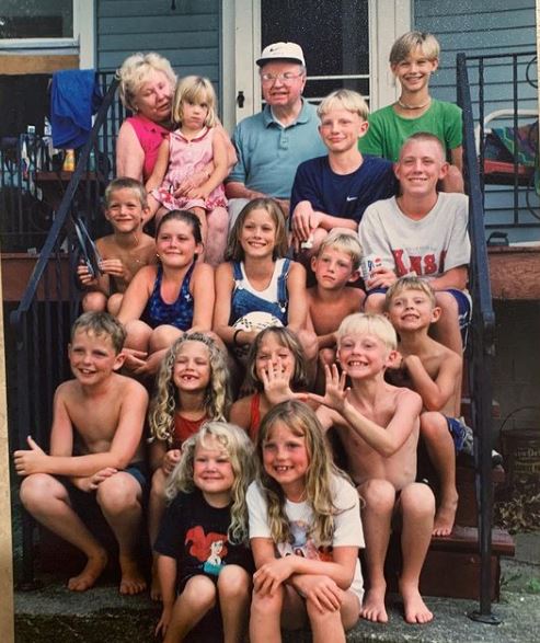 An old photo of Meghan King with her grandparents and siblings