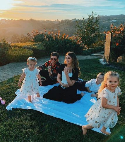 April Love Geary enjoys with her family