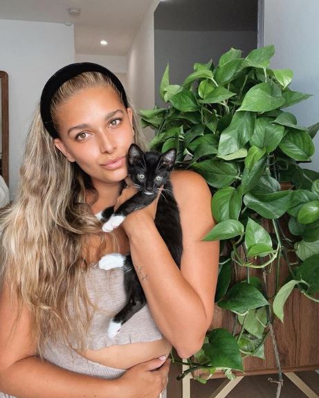 April Love Geary with her pet cat Bootsie
