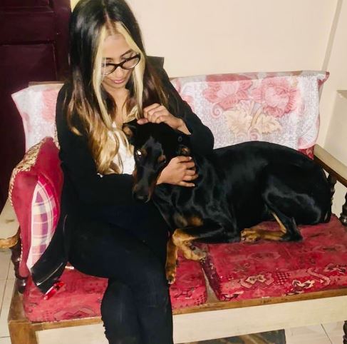 Baruah with her pet dog