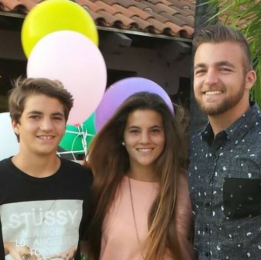 Brooklinn Khoury with her brother Sam Khoury and George Khoury.