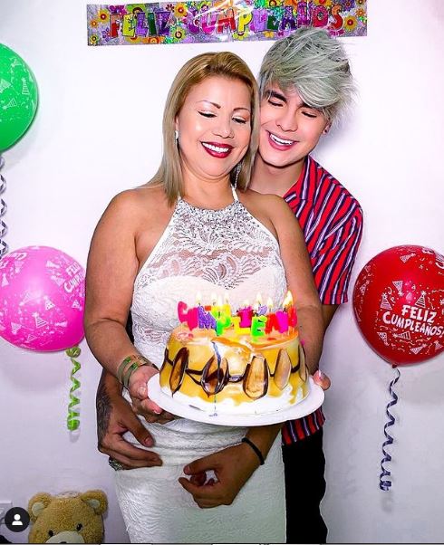 Carlos Feria with his mother