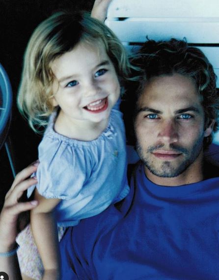 Childhood image of Meadow Walker with her dad