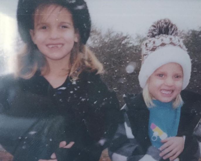 Childhood photo of Laura Bird Townley with her sister Ashley Bird