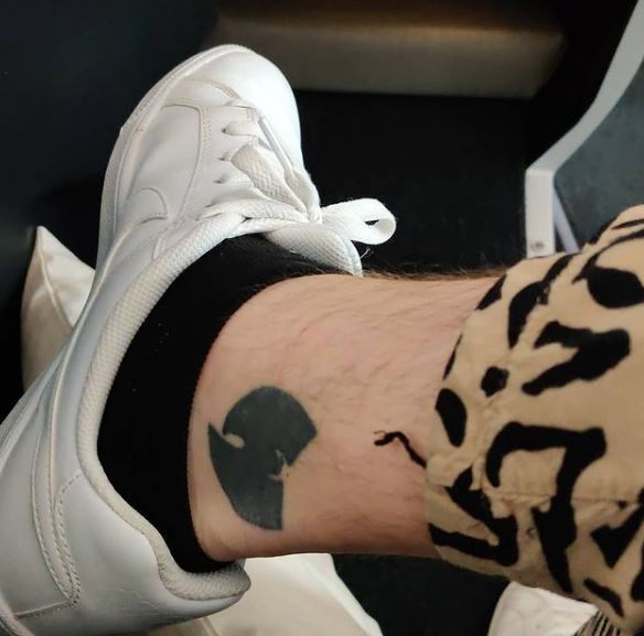 Christopher Robinson tattoo
