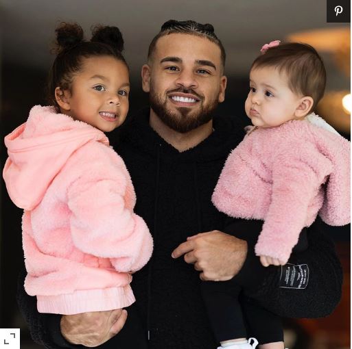 Cory Wharton with his daughters
