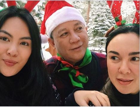 Dominique Cojuangco with her father and mother